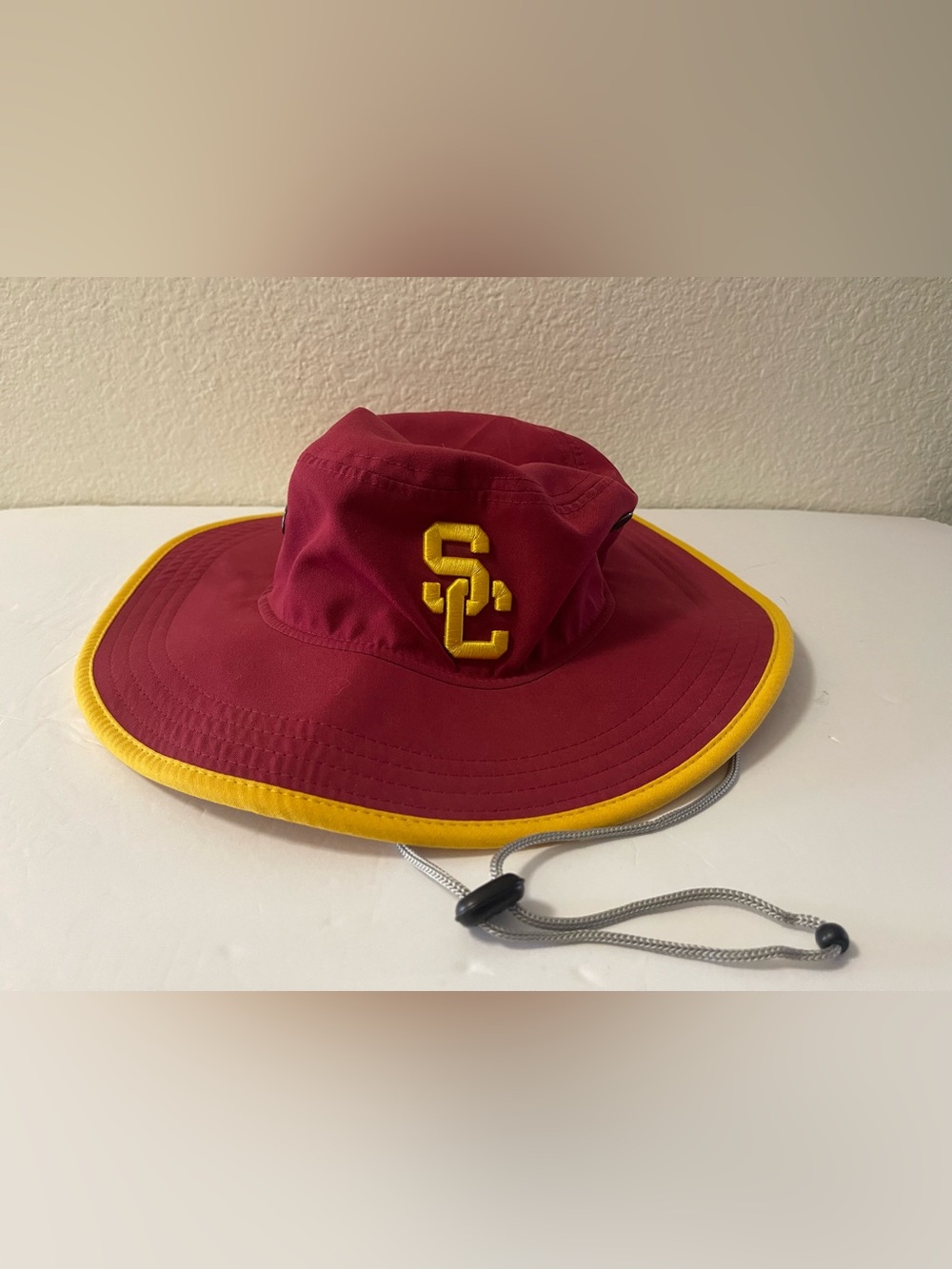 New Era Garnet and Yellow USC Bucket Hat